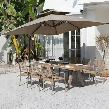 Открытый стол и стул Внутренний двор с зонтиком Вилла для отдыха на открытом воздухе Ротанговый стул Открытый сад Длинный стол и стул из ротанга